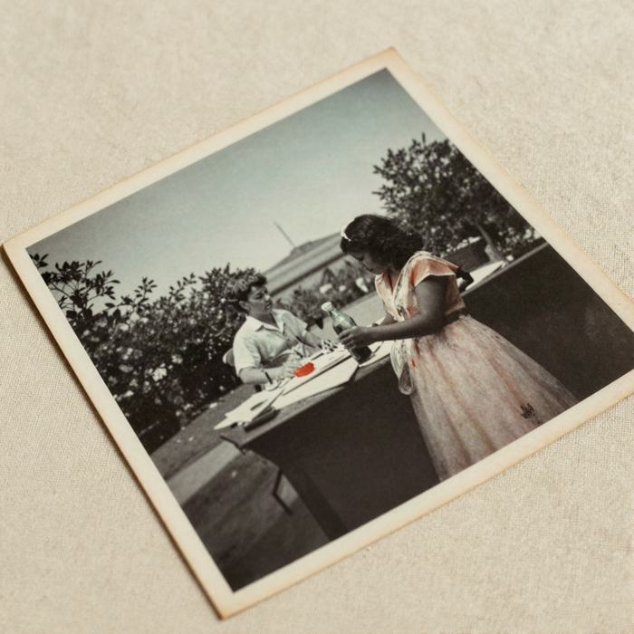 A faded colour photograph beside a black and white photograph of the same era